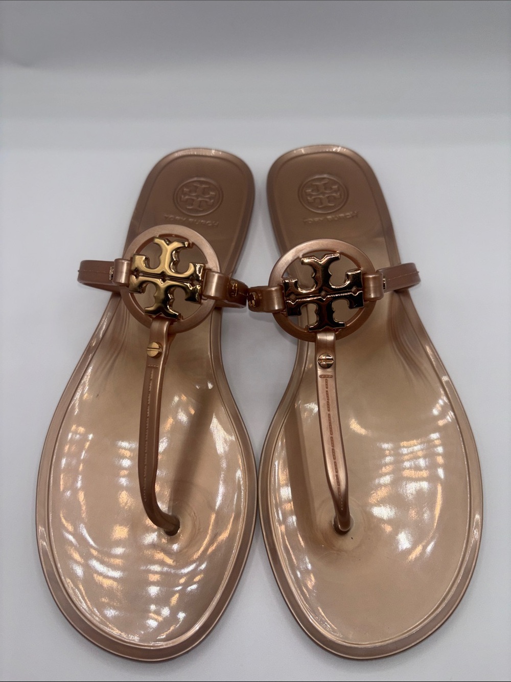 Tory Burch Metallic Rose Gold Logo Jelly Thong Sandals